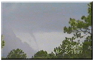 [Aug. 2, 1997:  Funnel cloud look-a-like visible from here in Whitney Mobile Home Park.]