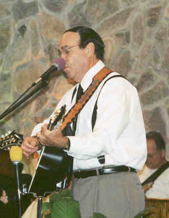 Our Pastor also sings and plays the guitar!!