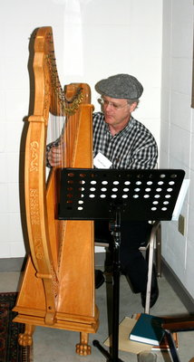 David playing the harp