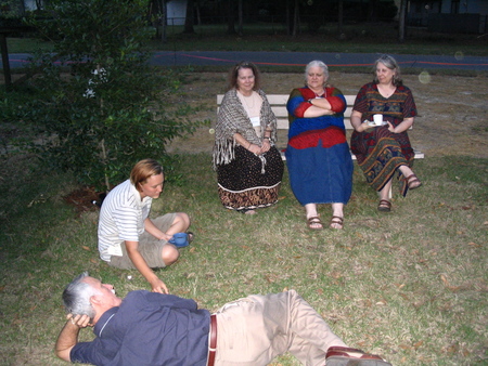 A group sitting on the lawn
